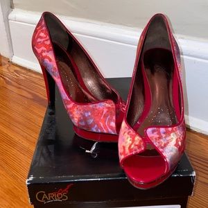 Satin red pumps by Carlos
